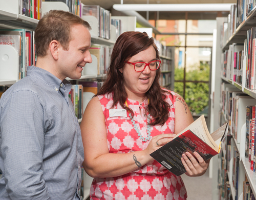 Librarian Helping Patron find book