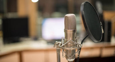 Studio with Microphone that has a Pop Filter attached